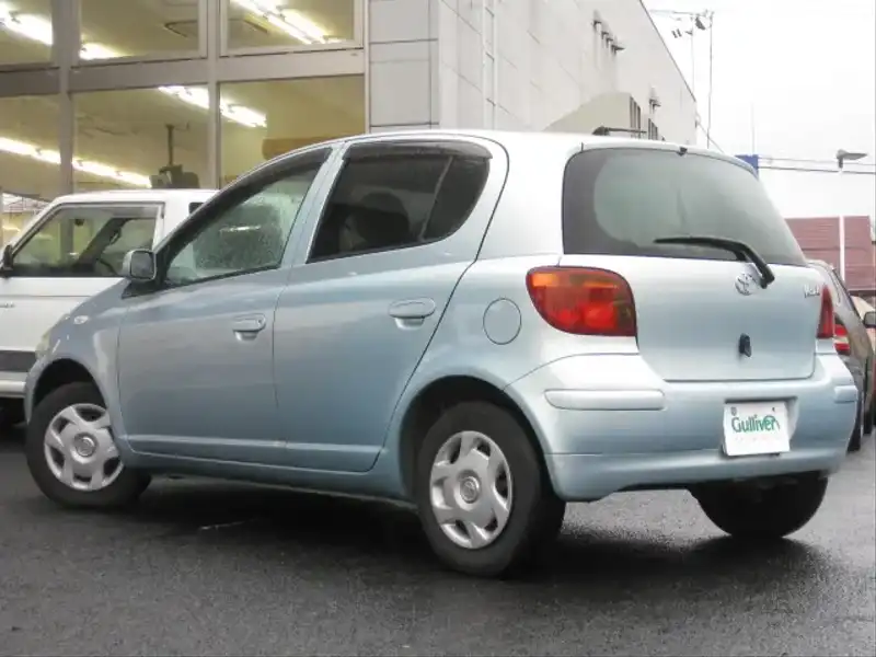 カタログ画像：ヴィッツ（VITZ） ペアスタイル 2004年2月 CBA-SCP10 1000cc ペールブルーマイカメタリック 燃費19.6km / l  バック