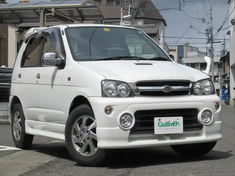 カタログ画像：テリオスキッド（TERIOS KID） テリオスキッド×キスマーク 2004年10月 TA-J111G 660cc ホワイト 燃費15.2km / l  メイン（その他）