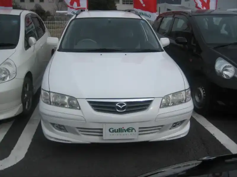 カタログ画像：カペラワゴン（CAPELLA WAGON） ＳＥ サードシート装着車 1999年11月 GF-GWEW 2000cc ピュアホワイト 燃費12.0km / l  フロント