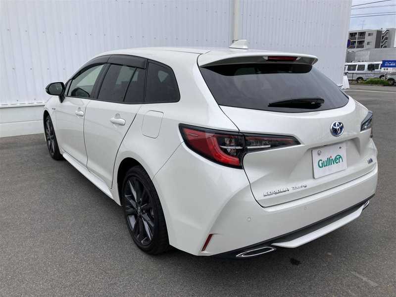 カタログ画像：カローラツーリング（COROLLA TOURING） ハイブリッド Ｇ 2024年4月 6AA-ZWE215W 1800cc スーパーホワイトⅡ 燃費27.5km / l バック