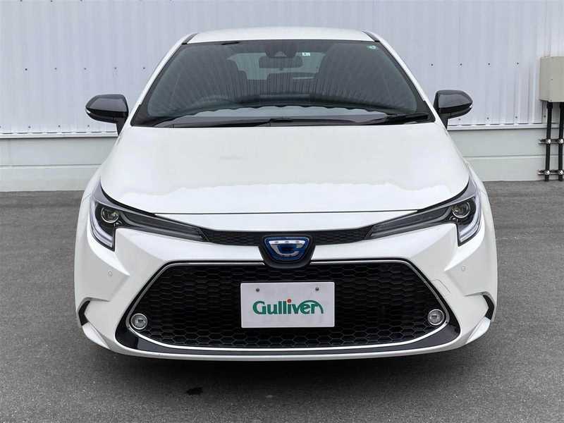 カタログ画像：カローラツーリング（COROLLA TOURING） ハイブリッド Ｇ 2024年4月 6AA-ZWE215W 1800cc スーパーホワイトⅡ 燃費27.5km / l フロント