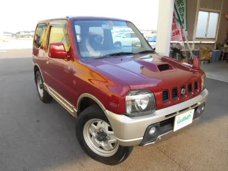 カタログ画像：ジムニー（JIMNY） ランドベンチャー 2001年5月 TA-JB23W 660cc カシスレッドパール／クールベージュメタリック 燃費16.4km / l  メイン（その他）