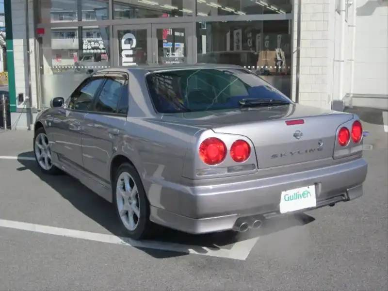 カタログ画像：スカイライン（SKYLINE） ２５ＧＴ 1998年5月 GF-ER34 2500cc アスリートシルバー（Ｍ） 燃費10.6km / l  バック