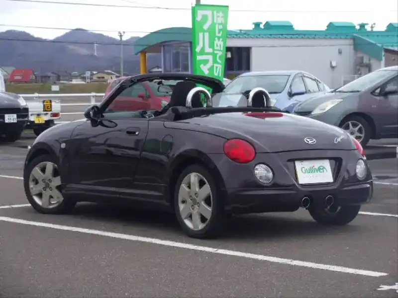 カタログ画像：コペン（COPEN） アクティブトップ 2010年8月 ABA-L880K 660cc ＤＣ・ブラックマイカメタリック 燃費15.2km / l  バック