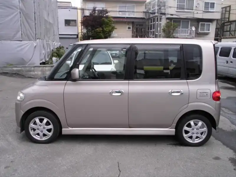 カタログ画像：タント（TANTO） Ｘリミテッド 2004年6月 ABA-L360S 660cc ライトローズメタリック 燃費16.8km / l  外装