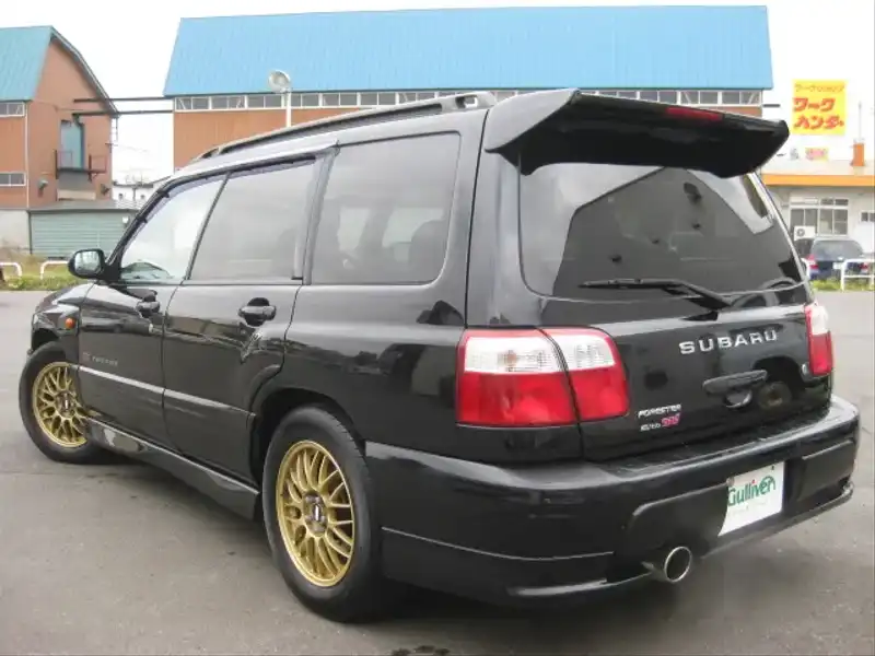 カタログ画像：フォレスター（FORESTER） Ｓ／ｔｂ－ＳＴｉⅡ リミテッド 2001年10月 GF-SF5 2000cc ブラック・マイカ 燃費10.2km / l  バック