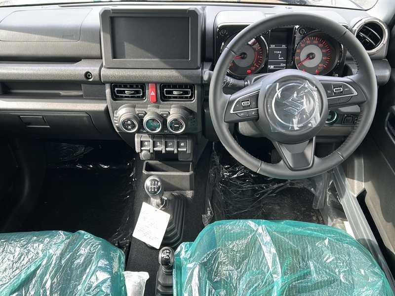 カタログ画像：ジムニーノマド（JIMNY NOMADE） ＦＣ 2025年4月 3BA-JC74W 1500cc アークティックホワイトパール 燃費14.9km / l フロント