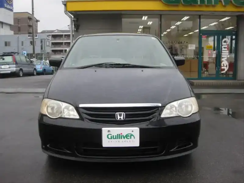 カタログ画像：オデッセイ（ODYSSEY） Ｌ 1999年12月 GH-RA6 2300cc ナイトホークブラック・パール 燃費11.0km / l  フロント