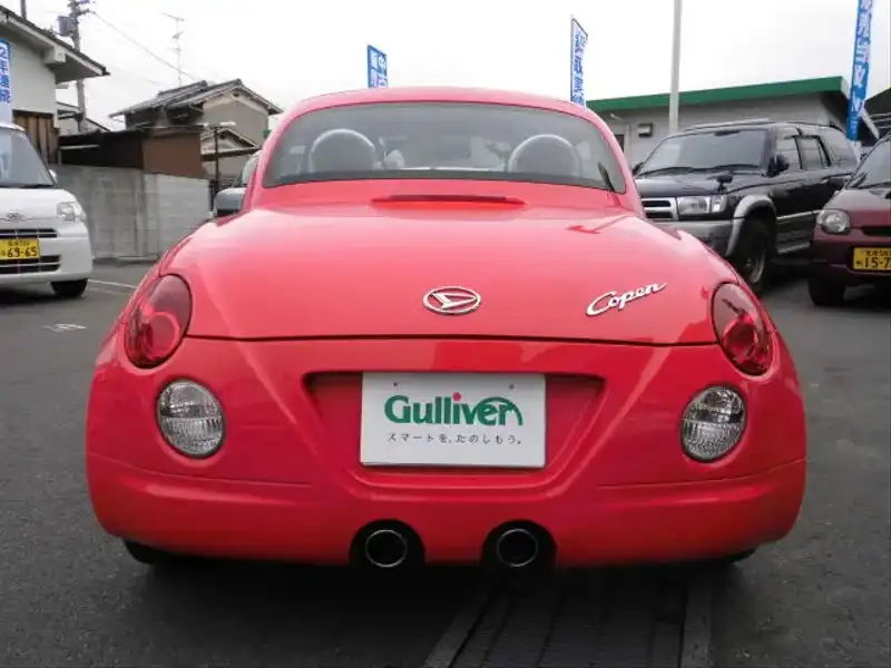 カタログ画像：コペン（COPEN） アクティブトップ 2010年8月 ABA-L880K 660cc ＤＣ・シャイニングレッド 燃費15.2km / l  バック