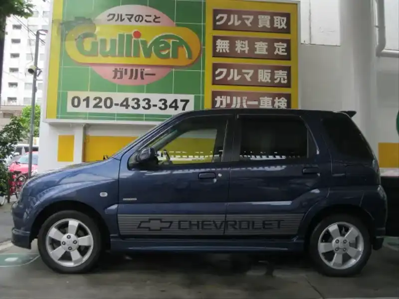 カタログ画像：シボレークルーズ（CHEVROLET CRUSE） １．３ＬＴ Ｓ－セレクション 2004年12月 LA-HR52S 1300cc パールメタリックカシミールブルー 燃費17.0km / l  外装