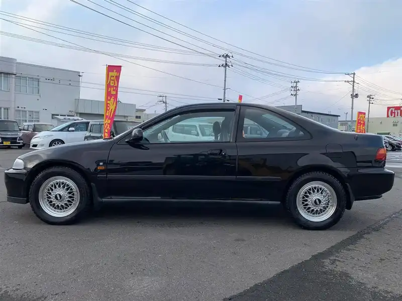 カタログ画像：シビッククーペ（CIVIC COUPE） ベースグレード 1994年2月 E-EJ1 1600cc グラナダブラック・パール 燃費14.0km / l  外装