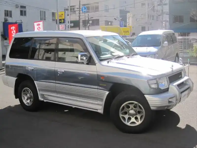 4006258 | カタログ画像：パジェロ（PAJERO） ミッドルーフワイド エクシードリミテッド 1999年2月 KD-V46WG 2800cc サテライトシルバー（Ｍ）／ネアーズブルー（Ｐ）・３ウェイ２トーン 外装