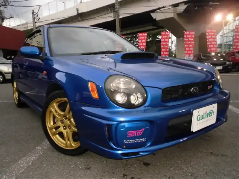 カタログ画像：インプレッサスポーツワゴン（IMPREZA SPORTS WAGON） ＳＴｉ 2001年9月 GH-GGB 2000cc ＷＲブルー・マイカ 燃費10.4km / l  メイン