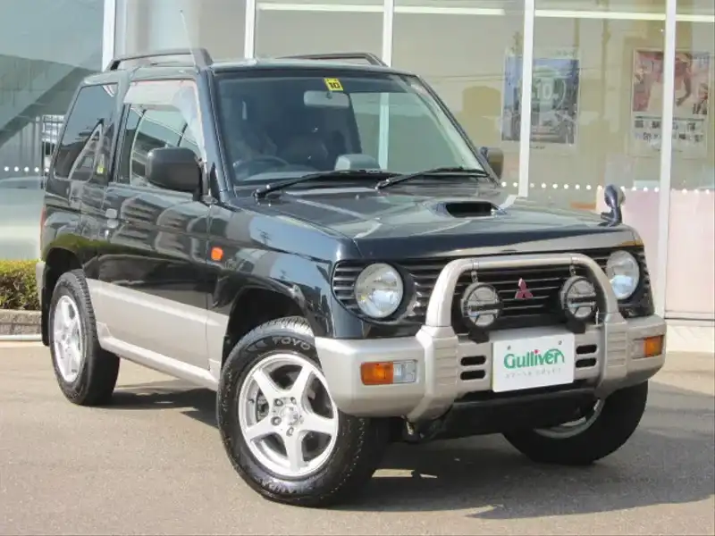 カタログ画像：パジェロミニ（PAJERO MINI） アイアンクロスＶ 1996年10月 E-H56A 660cc ピレネーブラック(パール)／シンフォニックシルバー(メタリック)･2トーン メイン