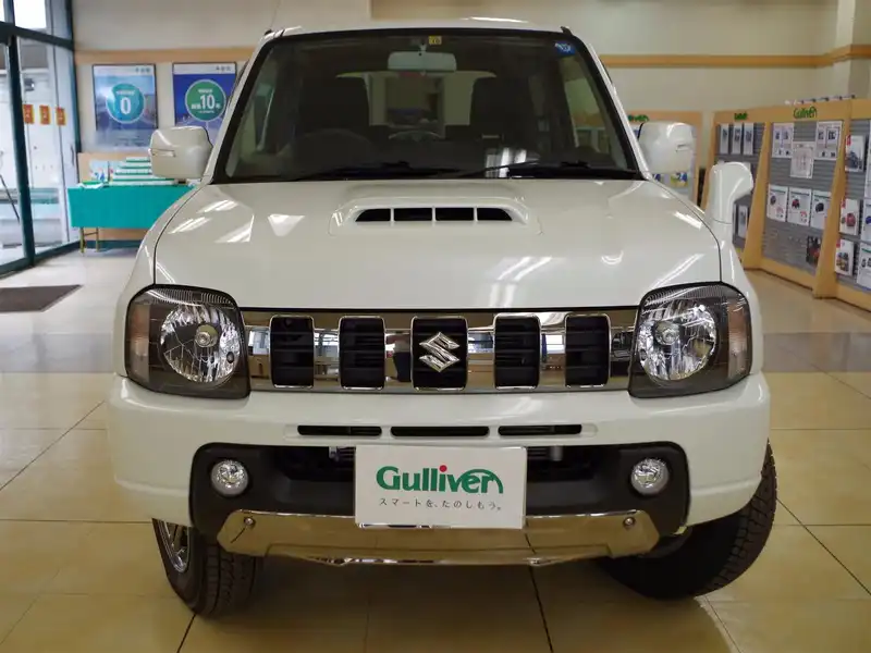 カタログ画像：ジムニー（JIMNY） ランドベンチャー 2014年8月 ABA-JB23W 660cc パールホワイト 燃費13.6km / l フロント