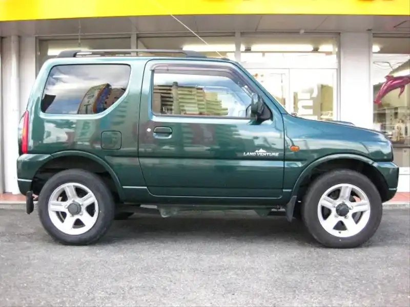 カタログ画像：ジムニー（JIMNY） ランドベンチャー 2006年6月 ABA-JB23W 660cc グローブグリーンパール／グラファイトグレーパールメタリック 燃費14.8km / l  外装