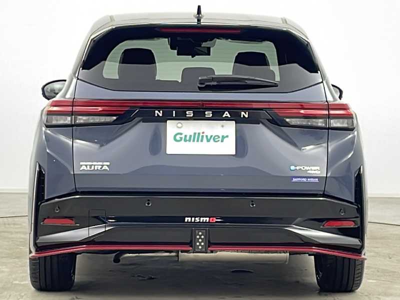 カタログ画像：オーラ（AURA） ニスモ 2024年7月 6AA-FE13 1200cc ダークメタルグレー（M）/スーパーブラック 2トーンorNISMOステルスグレー/スーパーブラック 2トーン 燃費23.3km / l バック