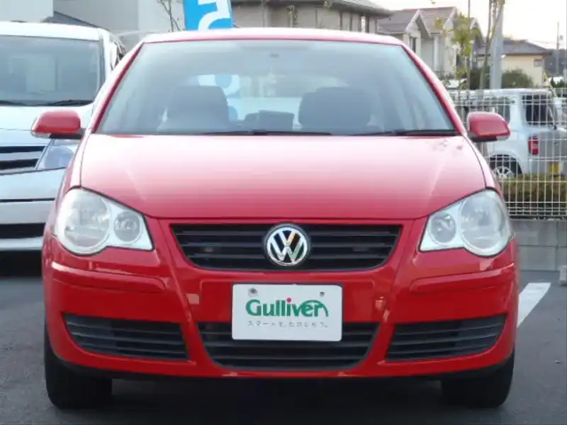 カタログ画像：ポロ（POLO） ４ドア 2006年2月 GH-9NBKY 1400cc フラッシュレッド 燃費14.4km / l  フロント