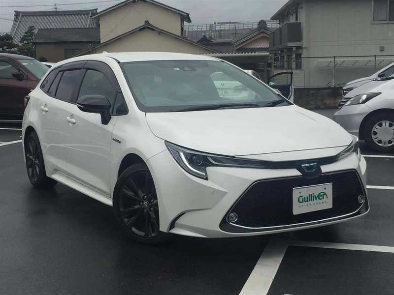 カタログ画像：カローラツーリング（COROLLA TOURING） ハイブリッド ダブルバイビー 2020年10月 6AA-ZWE214W 1800cc ホワイトパールクリスタルシャインorブラックマイカ×ホワイトパールクリスタルシャイン 燃費24.4km / l メイン