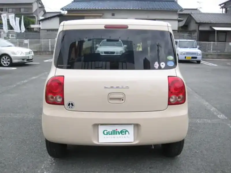 カタログ画像：アルトラパン（ALTO LAPIN） Ｇ 2012年5月 DBA-HE22S 660cc ミルクティーベージュメタリック 燃費23.2km / l バック