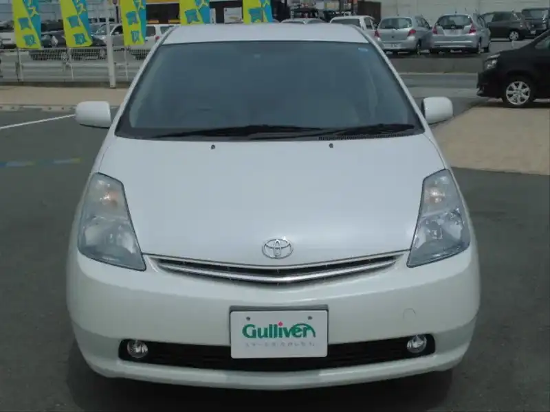 カタログ画像：プリウス（PRIUS） Ｓスタンダードパッケージ 2005年11月 DAA-NHW20 1500cc ホワイトパールクリスタルシャイン 燃費35.5km / l  フロント