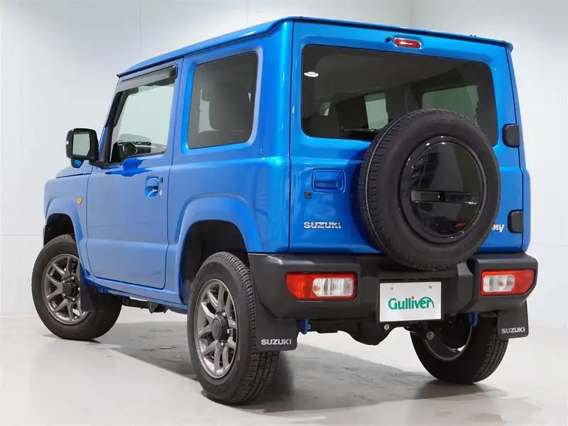 カタログ画像：ジムニー（JIMNY） ＸＣ 2019年10月 3BA-JB64W 660cc ブリスクブルーメタリック 燃費13.2km / l バック