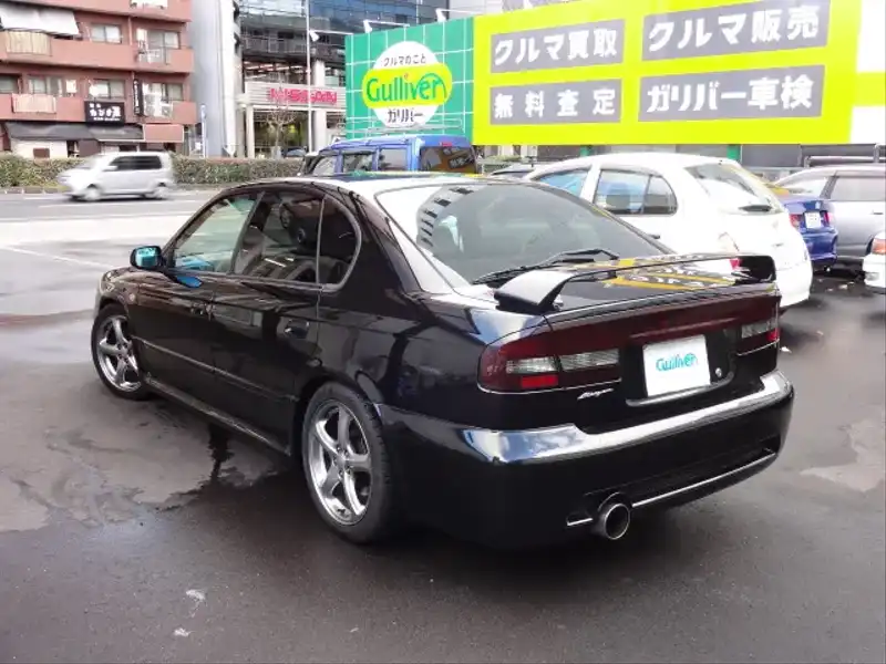 カタログ画像：レガシィＢ４（LEGACY B4） ブリッツェン２００２モデル 2002年3月 TA-BE5 2000cc ブラックトパーズ・マイカ 燃費11.4km / l  バック