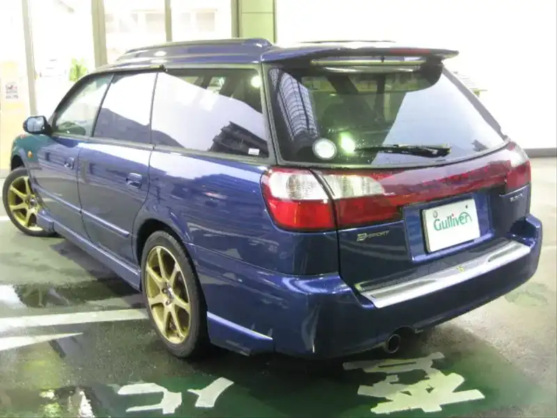 カタログ画像：レガシィツーリングワゴン（LEGACY TOURING WAGON） Ｂスポーツ 2002年8月 TA-BH5 2000cc ノーティックブルー・マイカ 燃費13.6km / l  バック