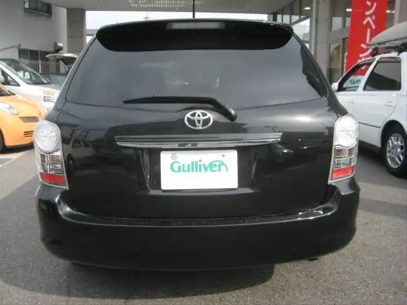 カタログ画像：カローラフィールダー（COROLLA FIELDER） １．５Ｘ エアロツアラー 2010年4月 DBA-NZE141G 1500cc ブラックマイカ 燃費20.0km / l  バック