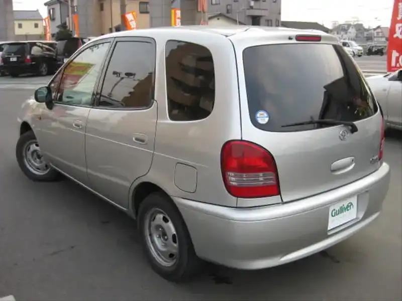 カタログ画像：カローラスパシオ（COROLLA SPACIO） Ｖパッケージ 1999年4月 GF-AE115N 1800cc シルバーメタリック 燃費11.4km / l  バック