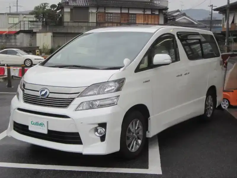 カタログ画像：ヴェルファイアハイブリッド（VELLFIRE HYBRID） ハイブリッドＶ プレミアムシートエディション 2012年9月 DAA-ATH20W 2400cc ホワイトパールクリスタルシャイン 燃費16.2km / l フロント