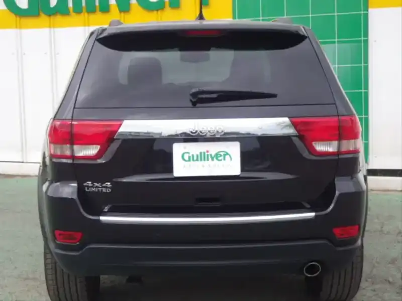 カタログ画像：ジープ・グランドチェロキー（JEEP GRAND CHEROKEE） リミテッド 2011年3月 ABA-WK36A 3600cc ブリリアントブラッククリスタルパールコート 燃費7.7km / l バック