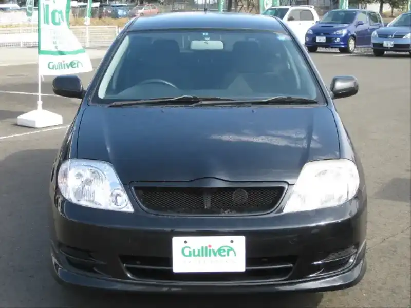 カタログ画像：カローラフィールダー（COROLLA FIELDER） Ｘ Ｇエディション 2004年2月 CBA-NZE124G 1500cc ブラックマイカ 燃費14.4km / l  フロント