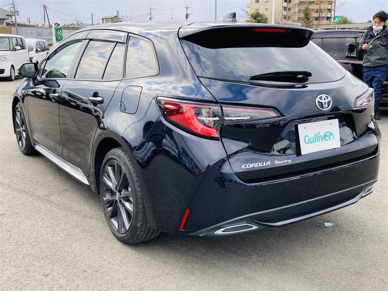 10152904 | カタログ画像：カローラツーリング（COROLLA TOURING） ハイブリッド Ｇ 2024年4月 6AA-ZWE215W 1800cc アティチュードブラックマイカ バック