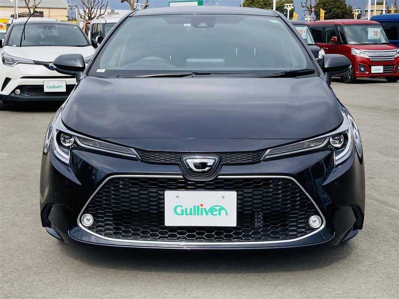 カタログ画像：カローラツーリング（COROLLA TOURING） ハイブリッド Ｇ 2024年4月 6AA-ZWE215W 1800cc アティチュードブラックマイカ 燃費27.5km / l フロント