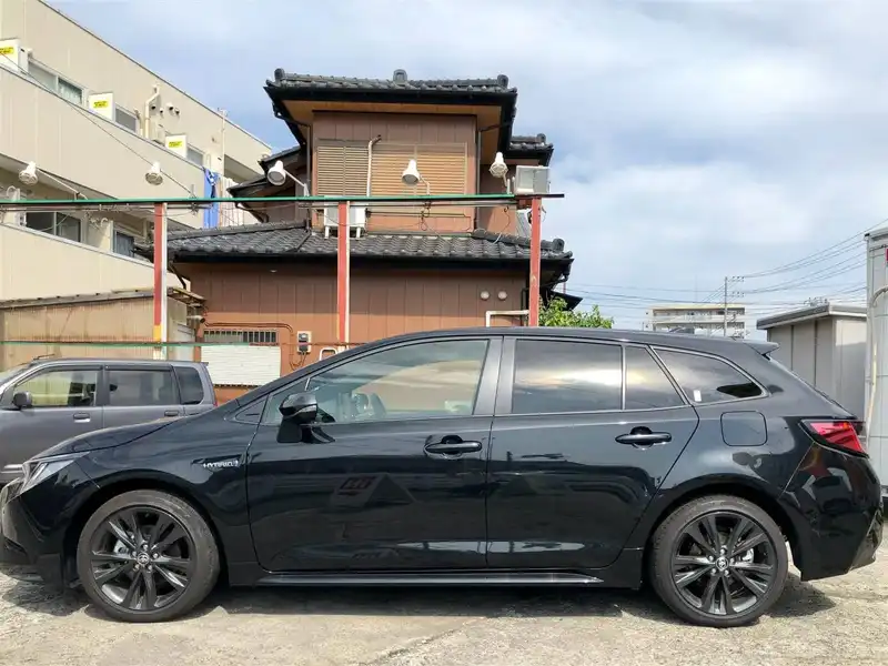 カタログ画像：カローラツーリング（COROLLA TOURING） ハイブリッド ダブルバイビー 2019年10月 6AA-ZWE214W 1800cc ブラックマイカ 燃費24.4km / l 外装