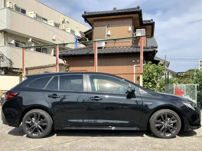 カタログ画像：カローラツーリング（COROLLA TOURING） ハイブリッド ダブルバイビー 2019年10月 6AA-ZWE211W 1800cc ブラックマイカ 燃費25.6km / l 外装