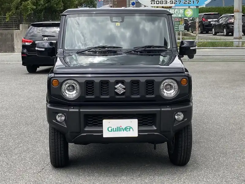 カタログ画像：ジムニー（JIMNY） ＸＧ スズキセーフティサポート装着車 2021年10月 3BA-JB64W 660cc ブルーイッシュブラックパール3 燃費14.3km / l フロント