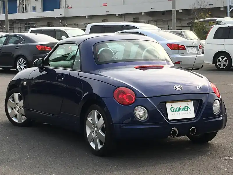 カタログ画像：コペン（COPEN） タンレザーエディション 2004年6月 ABA-L880K 660cc ＤＣ・ダークブルーマイカメタリック 燃費15.2km / l  バック