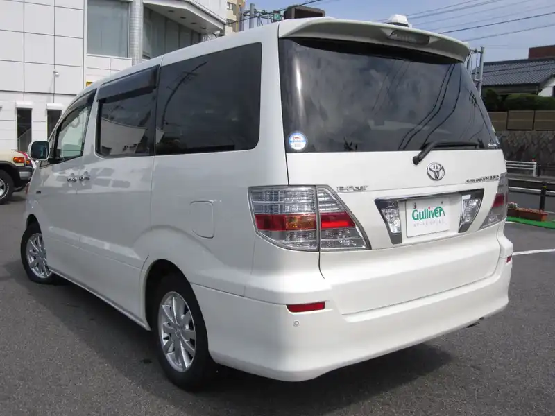 カタログ画像：アルファードハイブリッド（ALPHARD HYBRID） Ｇエディション サイドリフトアップシート装着車 2006年6月 DAA-ATH10W 2400cc ホワイトパールマイカ 燃費16.4km / l  バック