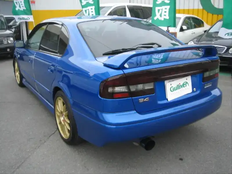 カタログ画像：レガシィＢ４（LEGACY B4） ＲＳＫ Ｓエディション 2002年11月 TA-BE5 2000cc ＷＲブルー・マイカ 燃費11.2km / l  バック