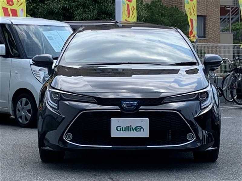 カタログ画像：カローラツーリング（COROLLA TOURING） ハイブリッド Ｇ－Ｘ 2019年10月 6AA-ZWE211W 1800cc ブラックマイカ 燃費29.0km / l フロント