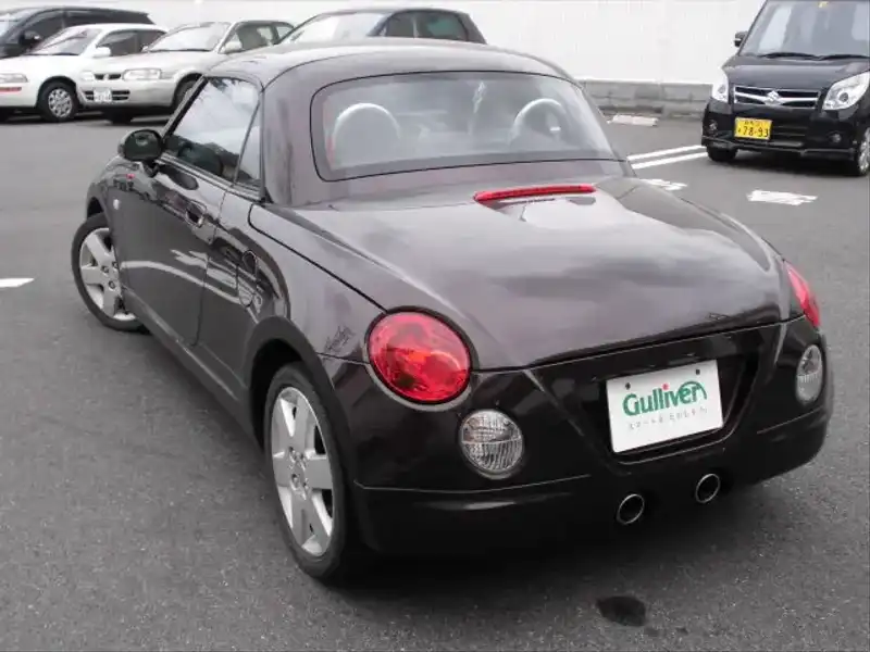 カタログ画像：コペン（COPEN） アクティブトップ 2010年8月 ABA-L880K 660cc ＤＣ・ブラックマイカメタリック 燃費15.2km / l  バック