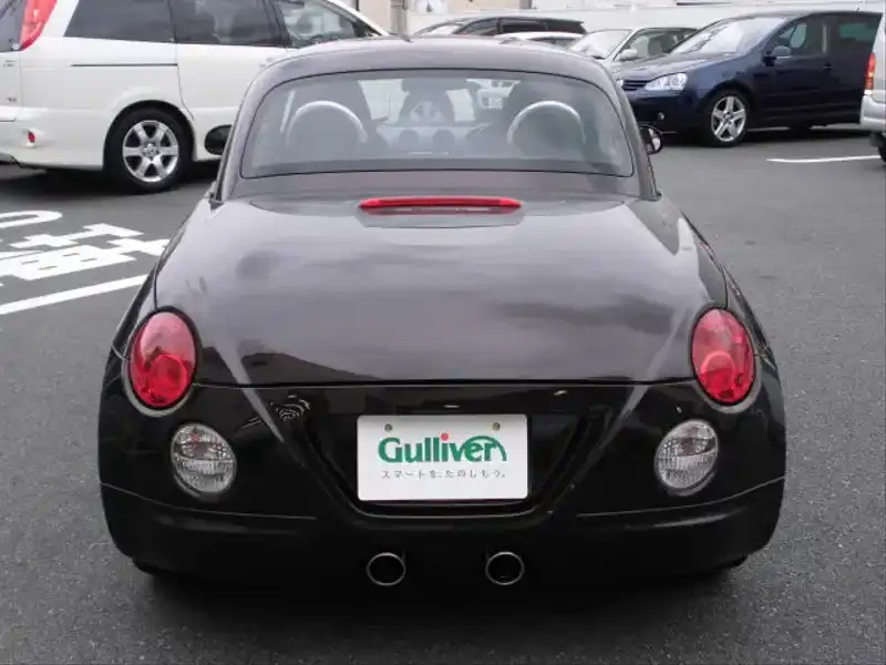 カタログ画像：コペン（COPEN） アクティブトップ 2010年8月 ABA-L880K 660cc ＤＣ・ブラックマイカメタリック 燃費15.2km / l  バック