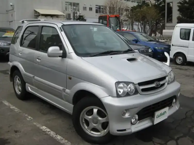 カタログ画像：キャミ（CAMI） Ｑ ターボエアロバージョン 2002年1月 TA-J102E 1300cc シルバーメタリック 燃費12.8km / l  メイン