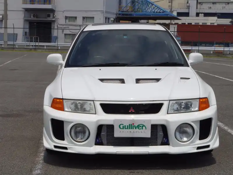 カタログ画像：ランサー（LANCER） ＧＳＲエボリューションⅤ 1998年1月 GF-CP9A 2000cc スコーティアホワイト（ソリッド） フロント