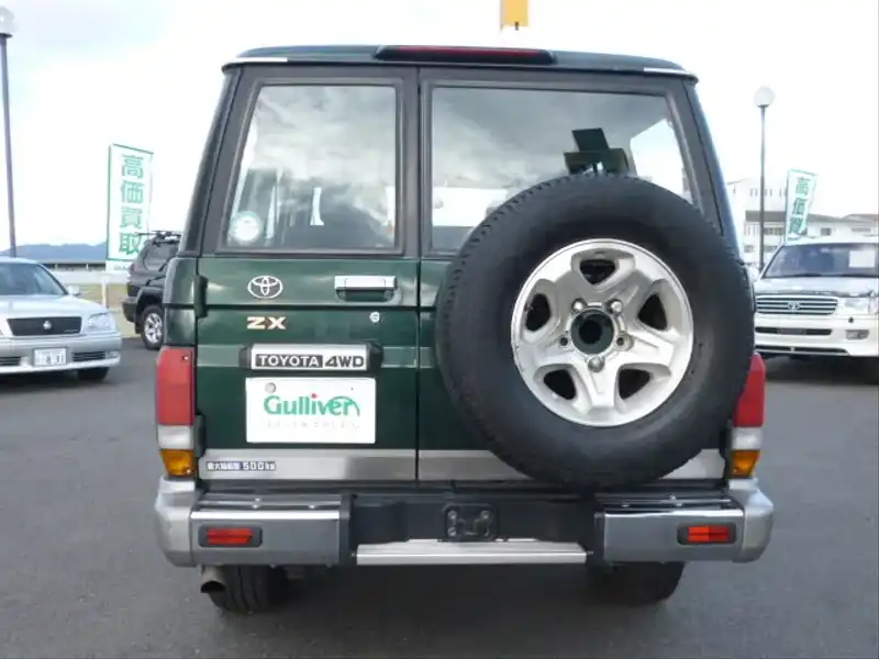 カタログ画像：ランドクルーザー７０（LAND CRUISER 70） ＺＸ ４ドア 2004年4月 KG-HZJ76K 4200cc ランドブリーズトーニングII バック