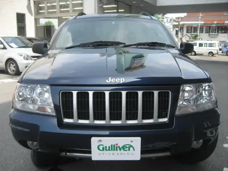 10020313 | カタログ画像：ジープ・グランドチェロキー（JEEP GRAND CHEROKEE） リミテッドＶ８ 2004年4月 GH-WJ47 4700cc パトリオットブルーパールコート フロント