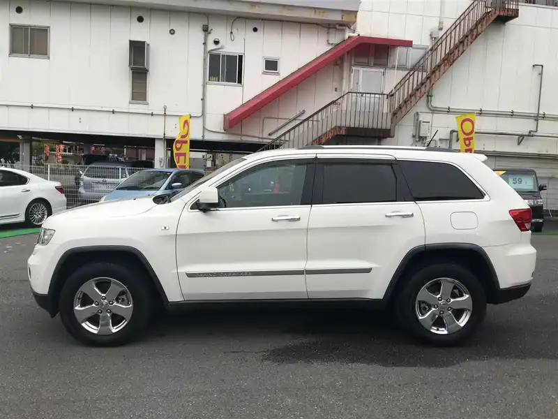 カタログ画像：ジープ・グランドチェロキー（JEEP GRAND CHEROKEE） リミテッド 2011年3月 ABA-WK36A 3600cc ストーンホワイトクリアコート 燃費7.7km / l 外装