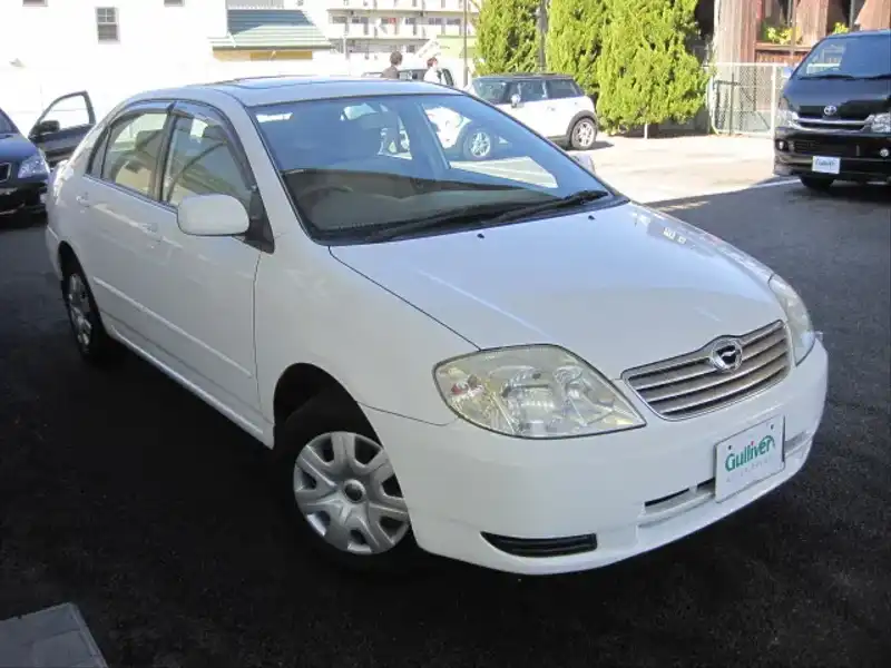 カタログ画像：カローラ（COROLLA） Ｇ Ｌパッケージ・ナビエディション 2003年9月 UA-NZE124 1500cc ホワイトパールクリスタルシャイン 燃費14.4km / l  メイン（その他）